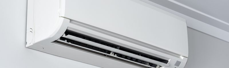 air con unit on wall near ceiling